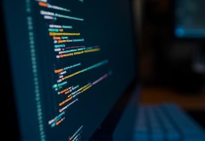 Code snippet displayed on a computer screen, representing software development